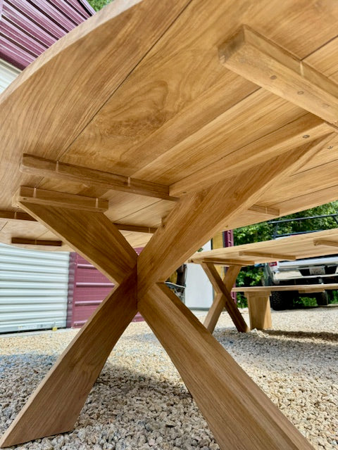 the base of the elliptical table showing the beefy legs and cross bracing