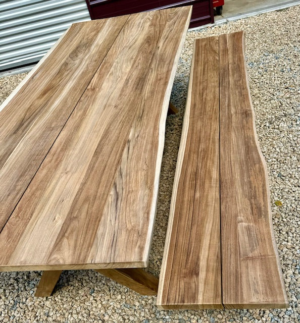 Live edge bench next to live edge table 